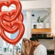 thumbnail image 4 of Globo de corazón hueco grande de 83 cm | Decoración de fiesta de papel de aluminio | Rojo brillante, rosa, dorado y plateado | Cadena de globos conectable | Accesorio fotográfico para cumpleaños y, 4 of 7