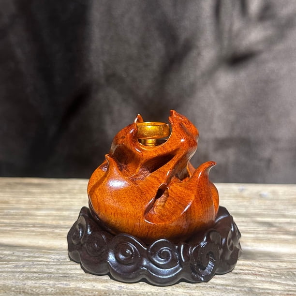 Rosewood flame-shaped incense burner with flowing smoke, creative cloud-shaped incense burner, ebony base, elegant fragrance diffuser.
