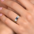 thumbnail image 4 of Gem Stone King 18K Yellow Gold Plated Silver Blue Mystic Topaz and White Zirconia Engagement Ring for Women | 2.00 Cttw | Round 5MM | Gemstone November Birthstone | Size 7, 4 of 6
