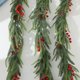 thumbnail image 5 of Guirnalda artificial de ratán verde navideño | Hojas de simulación realistas y acentos de bayas rojas | Tira decorativa interior para fiesta de fiestas en casa | 1,8 m de longitud | 1 pieza, 5 of 6