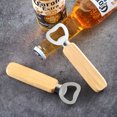 thumbnail image 1 of Abrebotellas de acero inoxidable Mango de madera Bebida Tapa de cerveza Lanzador de cocina, 1 of 8