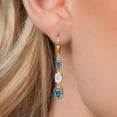 thumbnail image 3 of Gem Stone King 18K Yellow Gold Plated Silver Persian Blue Moissanite 3 Stone Dangle Earrings for Women (5.46 Cttw, Gemstone Birthstone, Oval 8X6MM, 7X5MM and 6X4MM), 3 of 6