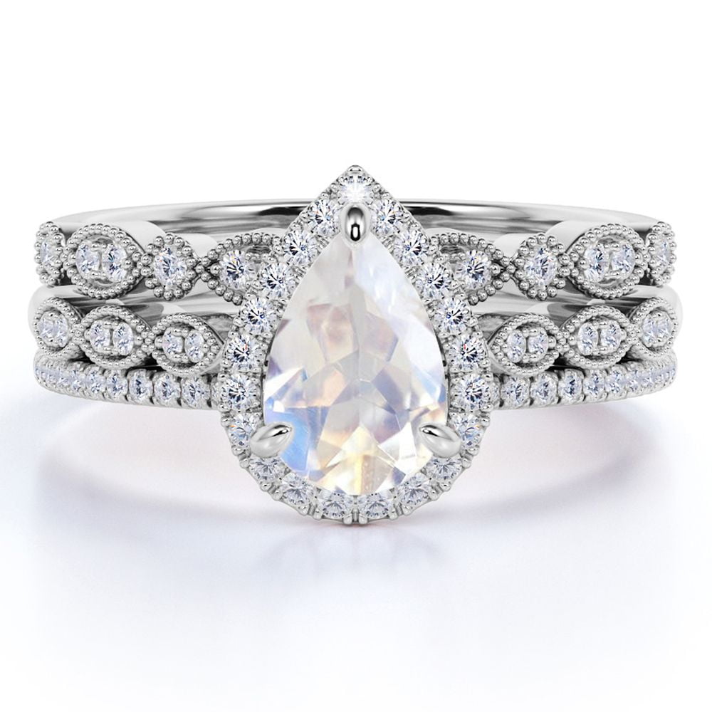 JeenMata 1.75 Carat Pear Cut Blue Moonstone and Moissanite Art Deco Trio Wedding Ring Set in 18k White Gold over Silver