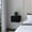 Black, variant on Nightstand with wall-mounted advantage / In an urban apartment / Features easy drawer access