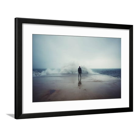 Back View Portrait of Young Man Standing against the Sea on a Large Concrete Pier with Big Wave Bea Framed Print Wall Art By