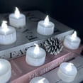 thumbnail image 3 of Luces de té LED que funcionan con pilas: paquete de 24 velas votivas sin llama, lámpara realista y brillante, parpadeante, decoración del hogar para fiestas navideñas (blanco), 3 of 5
