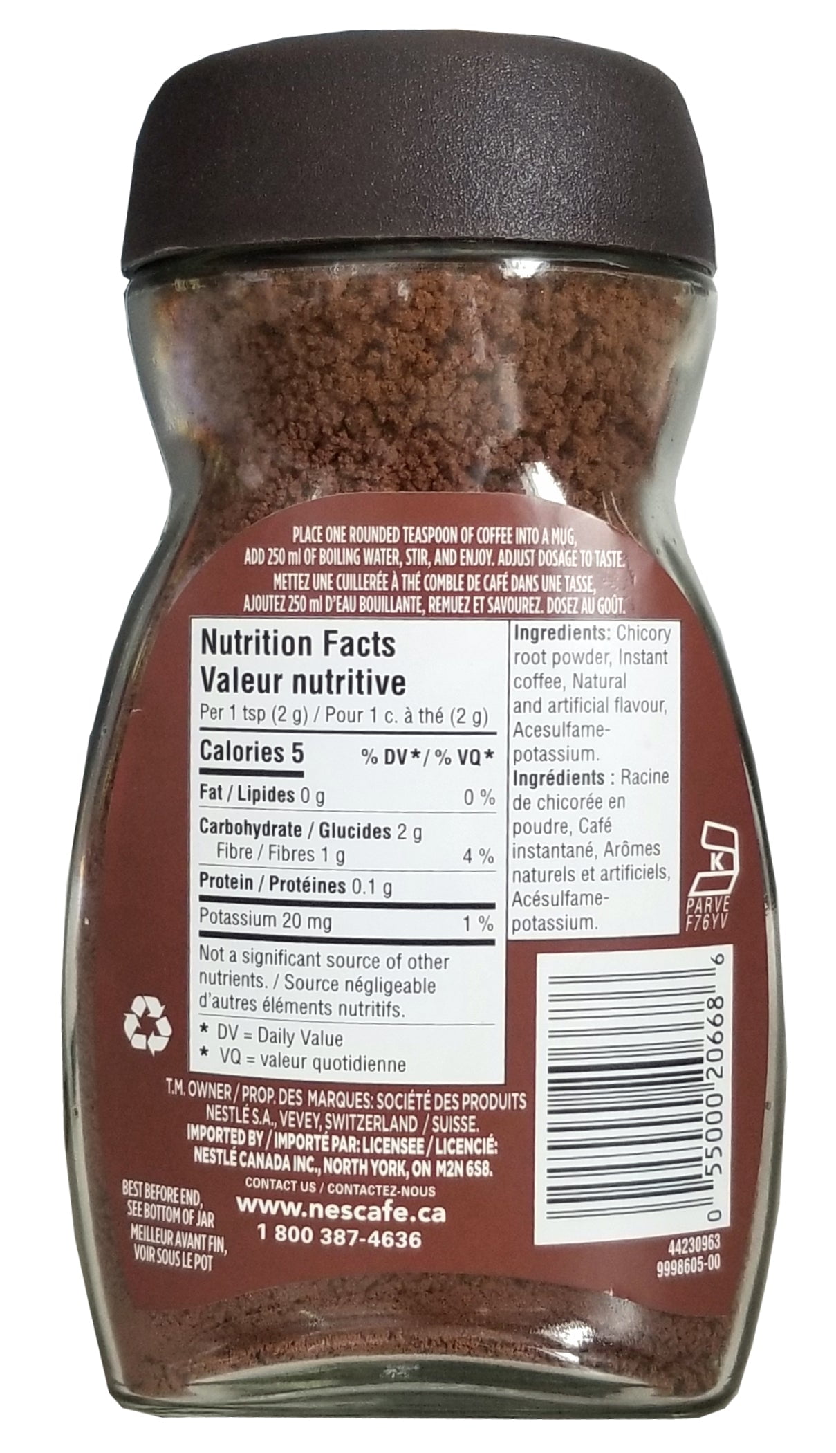 A glass jar of Nescafé instant coffee powder showing the nutrition facts label, relevant to the discussion on calories in instant coffee.