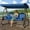 Blue, variant on Mvpipi 3 Seat Outdoor Porch Patio Swing with Canopy,Outdoor Swing for Adults,3 in 1 Convertible Swing Bed with Thickened Cushions & Cup Holders for Backyard, Porch, Garden,Triangle Style(Blue)