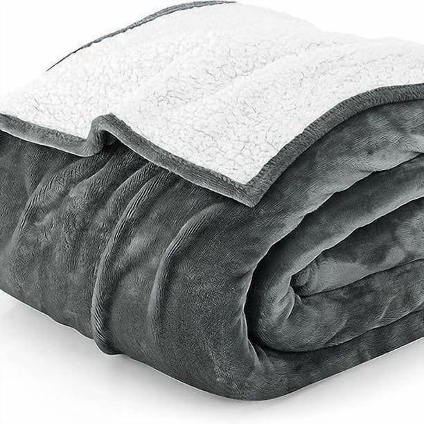 Manta Sherpa de 480 g/m², gruesa, cálida y reversible, ideal para cama, sofá, camping y viajes.
