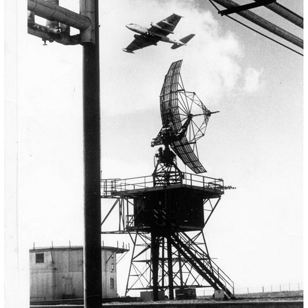 B-57 of the 4713th Radar Evaluation Squadron, with radar tower, in the ...