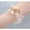 Pink, variant on WEUVEB Stylish Floral Wristlet Bracelet for Bridesmaids, Wedding Jewelry Accessory, Ideal for Special Events and Decorative Wear