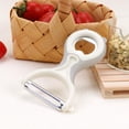 thumbnail image 1 of Pelador y abridor de botellas multifunción de estilo japonés | Utensilio de cocina con forma de oso para pelar frutas y verduras, 1 of 6