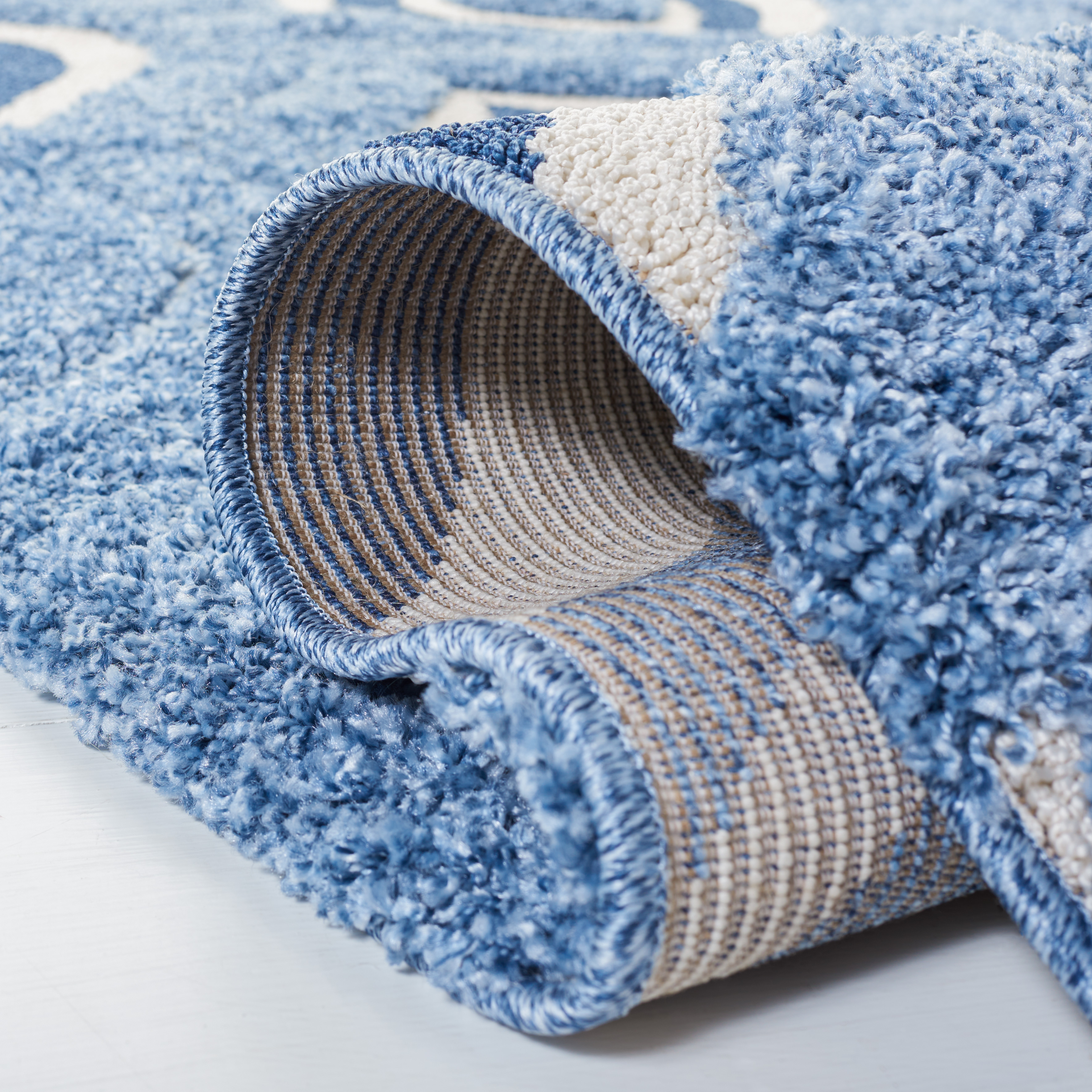 SAFAVIEH Florida Declan Geometric Swirls Shag Runner Rug, Blue/Ivory, 2'3" x 9'