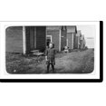 thumbnail image 2 of Historic Framed Print, Elsie Shaw, a 6 year old cartoner during the summer, Seacoast Canning Co., Factory #2. Her father is boss of cutting room in Factory #1., 17-7/8" x 21-7/8", 2 of 9