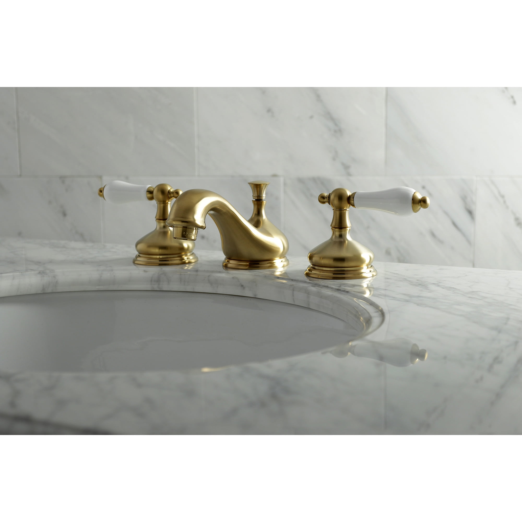 Kingston Brass KS1167PL Heritage Two-Handle 3-Hole Deck Mount Widespread Bathroom Faucet with Brass Pop-Up in Brushed Brass