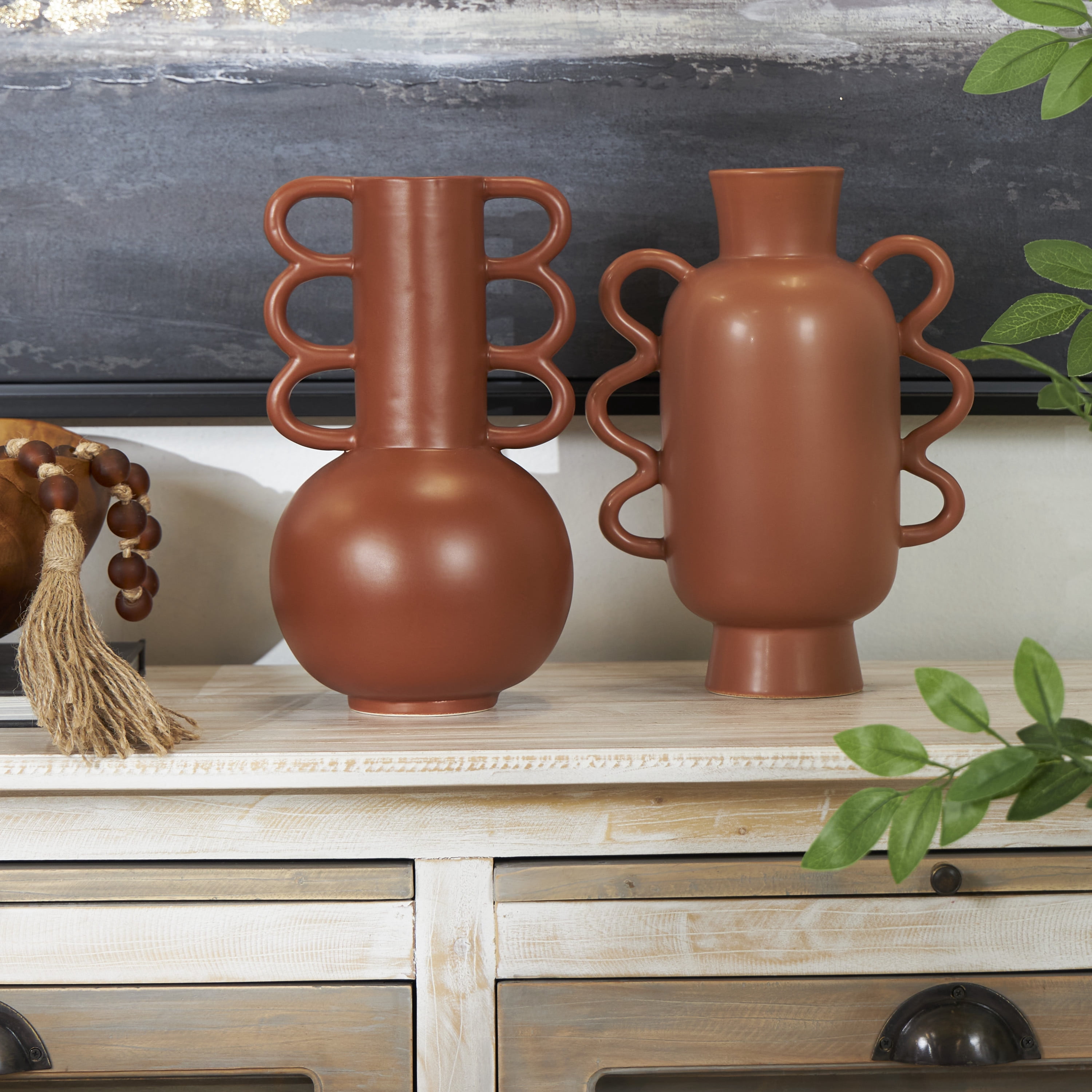 CosmoLiving by Cosmopolitan 11", 12"H Orange Ceramic Vase with Varying Shapes and Wavy Handles, Set of 2