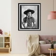 thumbnail image 3 of Historic Framed Print, [Half-length portrait of Indian with decorated face, feather and bead ornaments, seated, facing right].D.D. Wilder, The Dalles, Ore., photographer, novelties, 17-7/8" x 21-7/8", 3 of 9