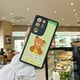 thumbnail image 2 of ¡Mantén tu iPhone seguro y a la moda con esta llamativa funda para teléfono con estampado de dibujos animados!, 2 of 4