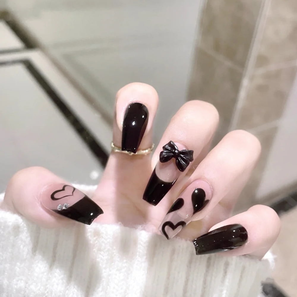 These black nail art designs are dark and full of terrors...