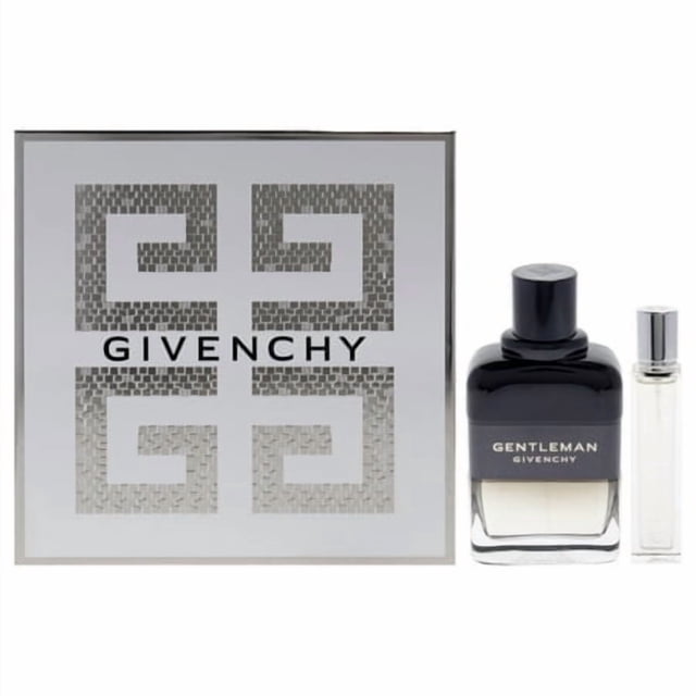 Givenchy Gentleman Boisee For Men - 2 Pc Gift Set featuring a 3.3oz EDP spray and a 0.42oz travel-size EDP spray. The set includes a sleek black bottle with silver accents and a compact travel spray, presented in an elegant box with the Givenchy logo and geometric design. Ideal for gifting or personal use, this fragrance set embodies modern masculinity with its woody and spicy scent profile.