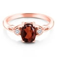 thumbnail image 2 of Gem Stone King 18K Rose Gold Plated Silver Red Garnet and White Moissanite 3-Stone Rings for Women (1.58 Cttw, Gemstone January Birthstone, Oval 8X6MM, Available in Size 5, 6, 7, 8, 9), 2 of 5