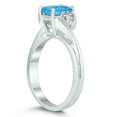 thumbnail image 2 of SZUL Women's 7X5MM Blue Topaz and Diamond Twist Ring in 10K White Gold, 2 of 4