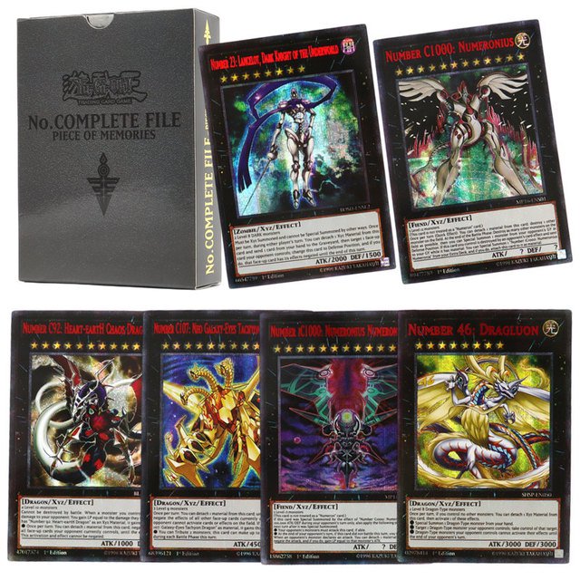 66-148PCS Yugioh Cards with Tin Box Yu Gi Oh Card Holographic English Version Golden Letter Duel Link Game Card Blue Eyes Exodia. The image displays a set of holographic Yu-Gi-Oh! trading cards with intricate designs and golden lettering, paired with a black tin box labeled 'No. Complete File Piece of Memories.' Featured cards include Number C1000: Numeronius and Number 46: Dragluon, highlighting their detailed artwork and game stats.