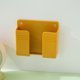 thumbnail image 1 of Soporte de caja de carga de teléfono móvil montado en la pared, base de control remoto de pasta, base de estante de almacenamiento de pared sin perforaciones, 1 of 4