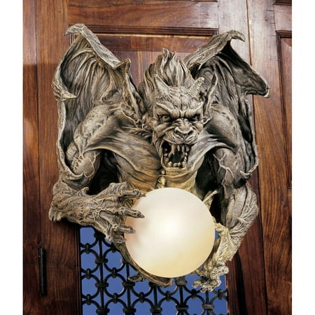 Design Toscano Merciless  the Gargoyle Lighted Wall Sculpture • Hand-cast using real crushed stone bonded with high quality designer resin• Takes one 40 watt bulb or CFL/LED equivalent• Convenient switch on cord • Exclusive to the Design Toscano brand and perfect for your home or garden