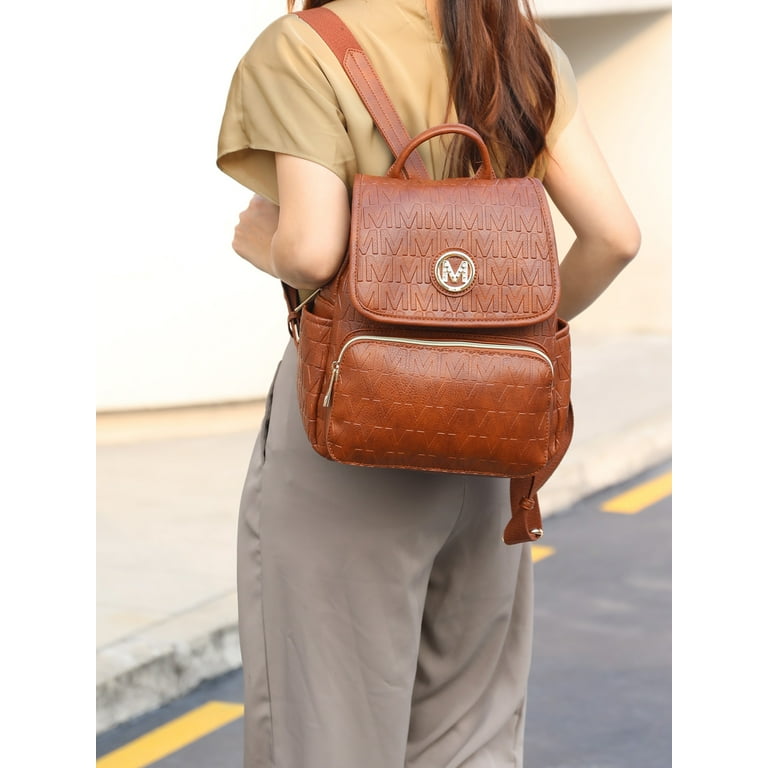 Monogram backpack cheap leather