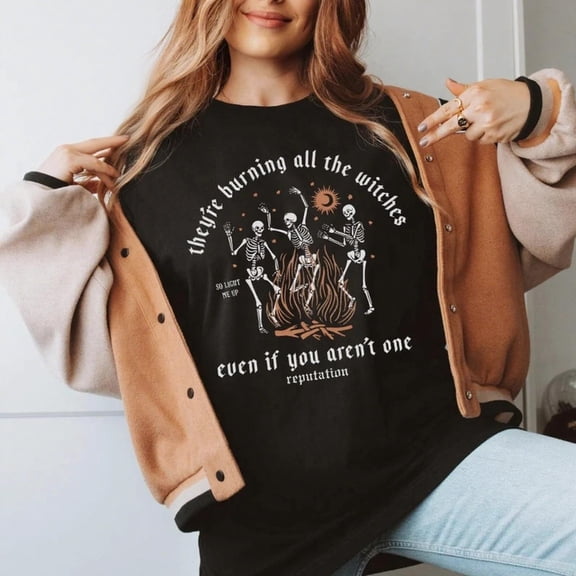 Festive Skeleton & Witch Graphic Tee, Tops Has Centered "they're burning all the witches even if you aren't one reputation" & Skeleton - Witch Design, Round Neck Regular Fit T - shirts, Size(S - 5XL)
