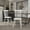 White, variant on Emma + Oliver Set of Two Premium Solid Wood Spindle Back Armless Dining Chairs in Black with Saddle Seats and Felt Floor Protectors