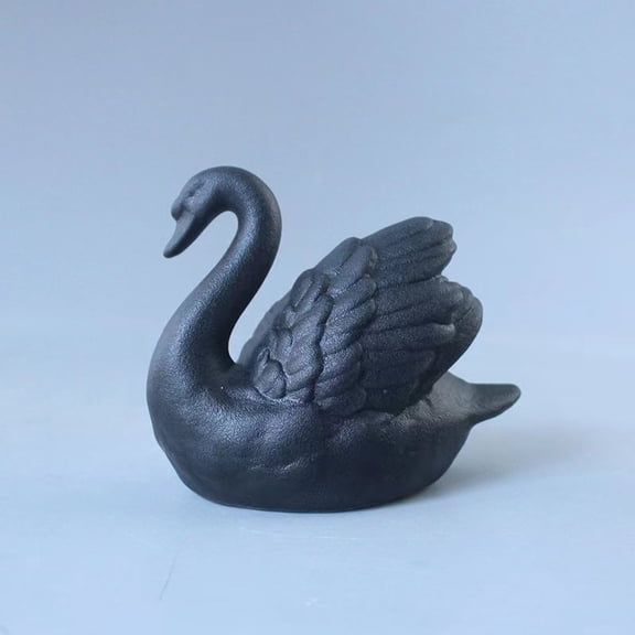 Modern minimalist black and white swan ceramic figurines for couples, a wedding gift, home decor, and wedding room decoration.