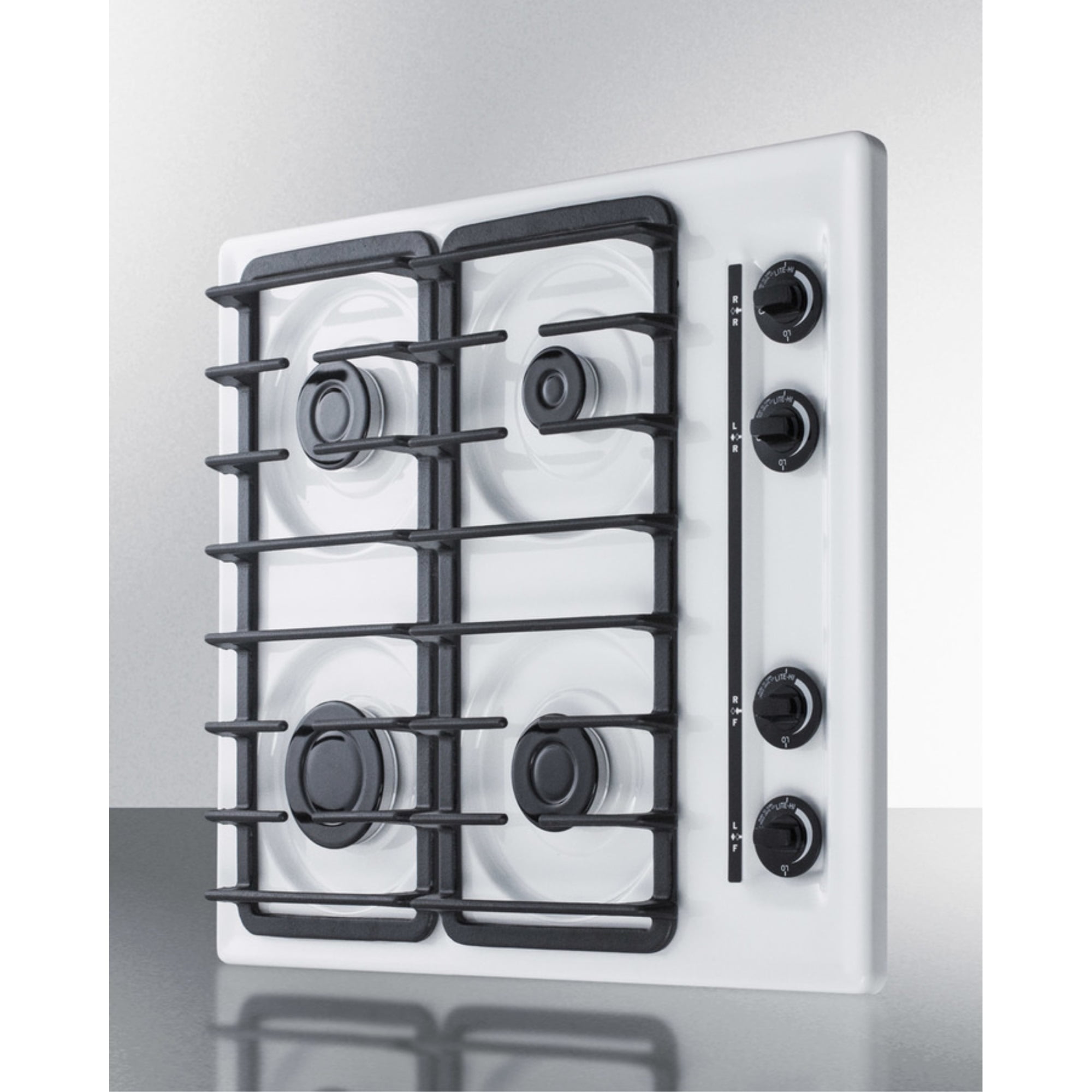 24" wide gas cooktop with four sealed burners, white porcelain surface, and cast iron grates; made in the USA