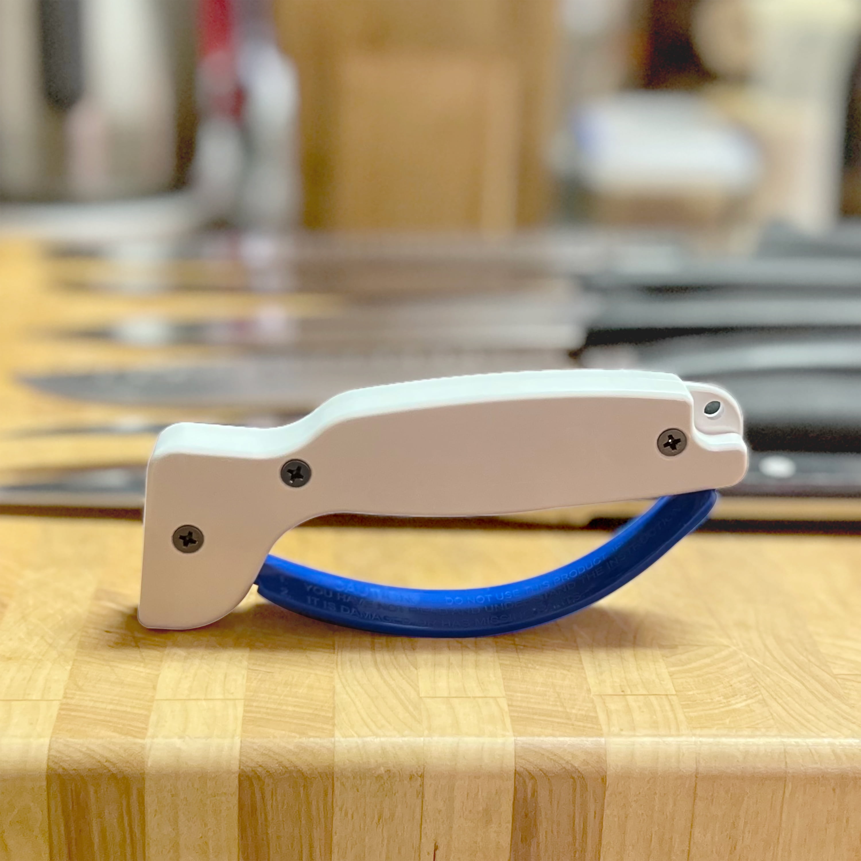 FMP Accusharp White Plastic Manual Knife Sharpener - 5L x 1/2W x 1H