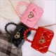 thumbnail image 4 of Bolso bandolera pequeño de piel sintética con asa de cadena y perlas de color caramelo para niños, bolso bandolera pequeño con forma de corazón para mujer, regalo, 4 of 5