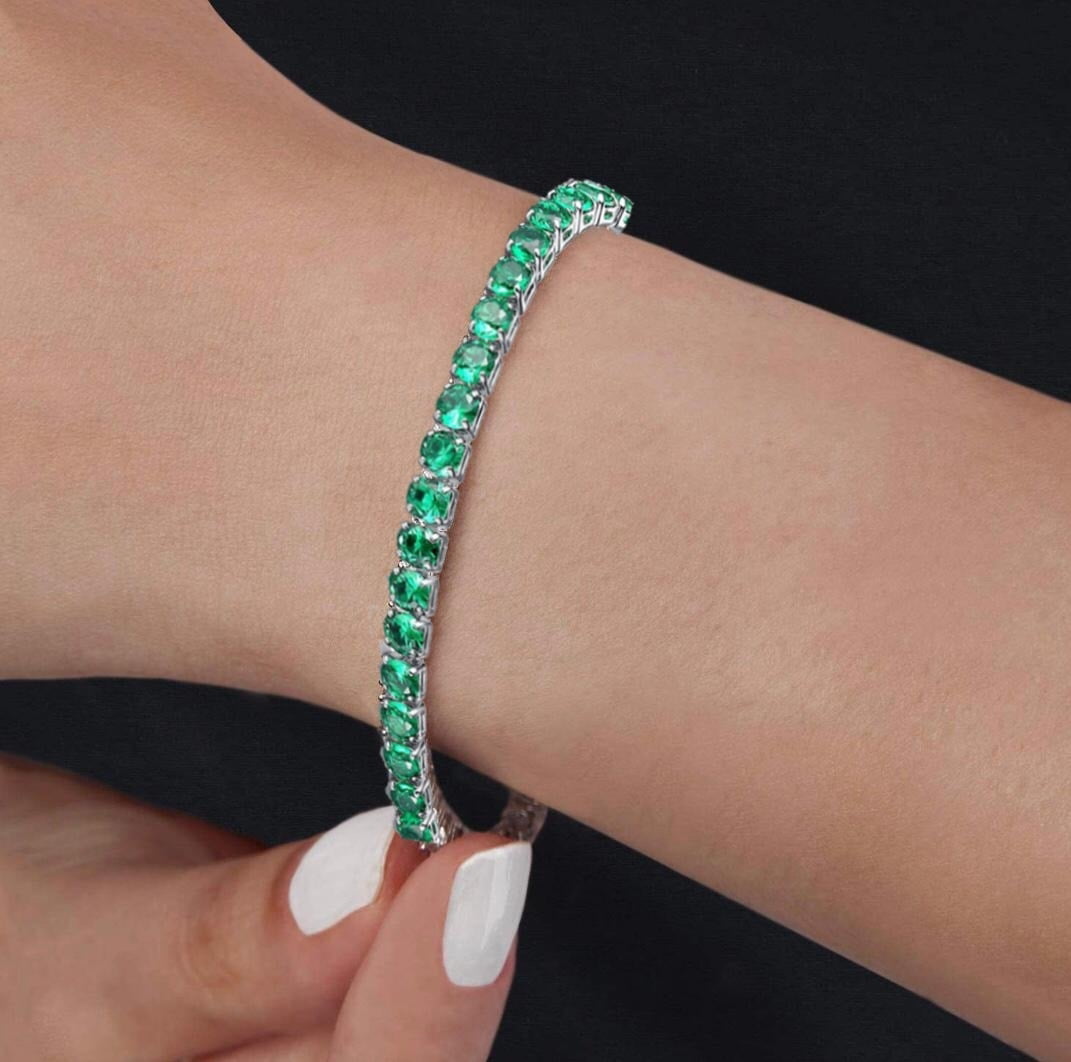Gem Jewelers - 18K White Gold Round Cut Emerald Tennis Bracelet