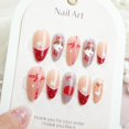 thumbnail image 1 of Uñas postizas press on Hrnsnails almendradas medianas con diseño navideño, 1 of 6