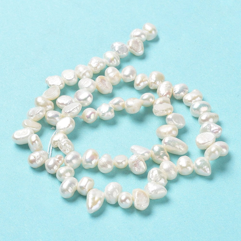 1Strand Natural Keshi Pearl Beads Strands Cultured Freshwater Pearl Grade 4A Baroque Pearls Rice White 7~10x5~6.5x4~4.5mm Hole: 0.7mm about 69~74pcs/strand 13.78''(35cm)