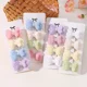thumbnail image 4 of Juego de pinzas para el pelo de color caramelo para niñas, lazo de doble capa, lindo flequillo, pasador de algodón seguro, accesorios para el cabello para bebés, 4 unids/set, 4 of 5