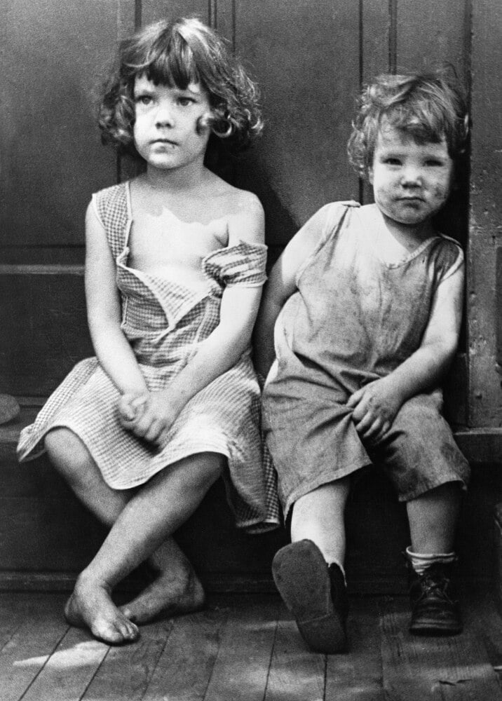 Poverty: Children 1935 /Ntwo Impovished Children In The Slum Section