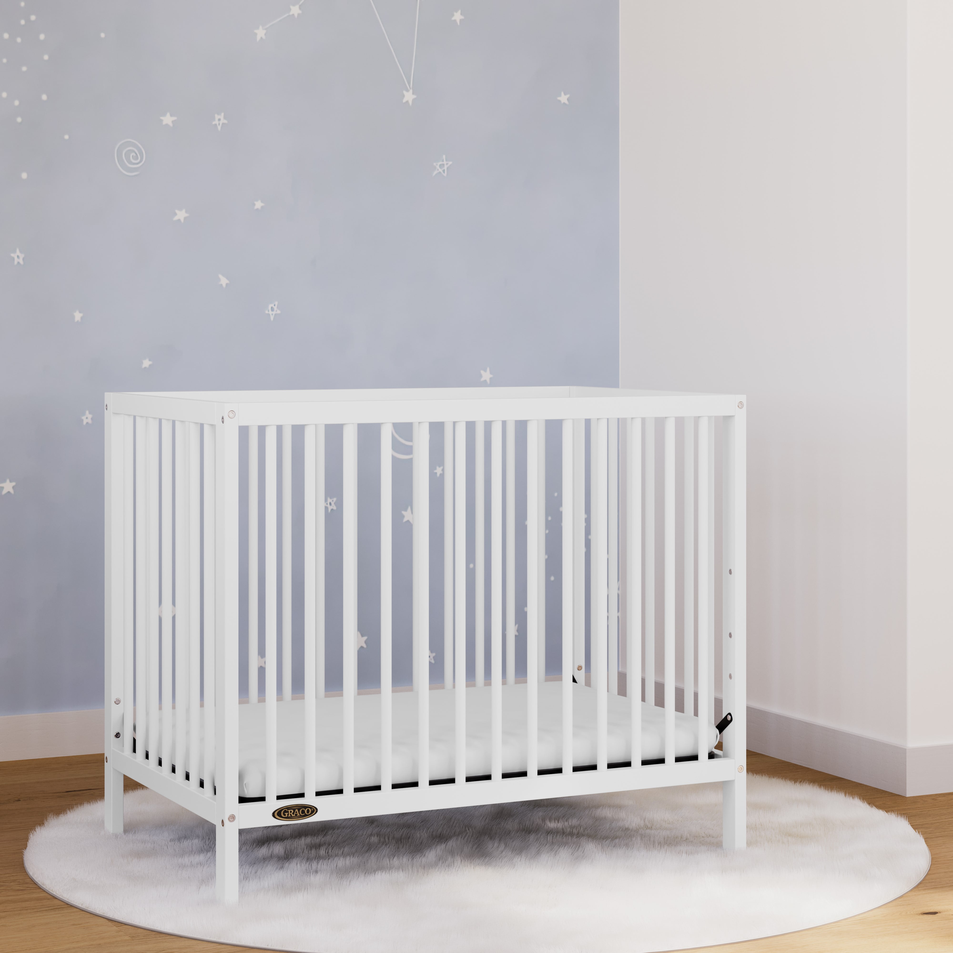 Graco Teddi 4-in-1 Convertible Mini Baby Crib with Mattress, White