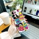 thumbnail image 3 of Muestra tu estilo con una funda de teléfono de goma TPU moderna y resistente a los impactos adornada con un patrón de dibujos animados, 3 of 4