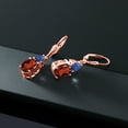 thumbnail image 4 of Gem Stone King 18K Rose Gold Plated Silver Red Garnet and Blue Created Sapphire Dangle Earrings for Women (6.68 Cttw, Gemstone January Birthstone, Oval 10X8MM, Trillion 5MM), 4 of 4