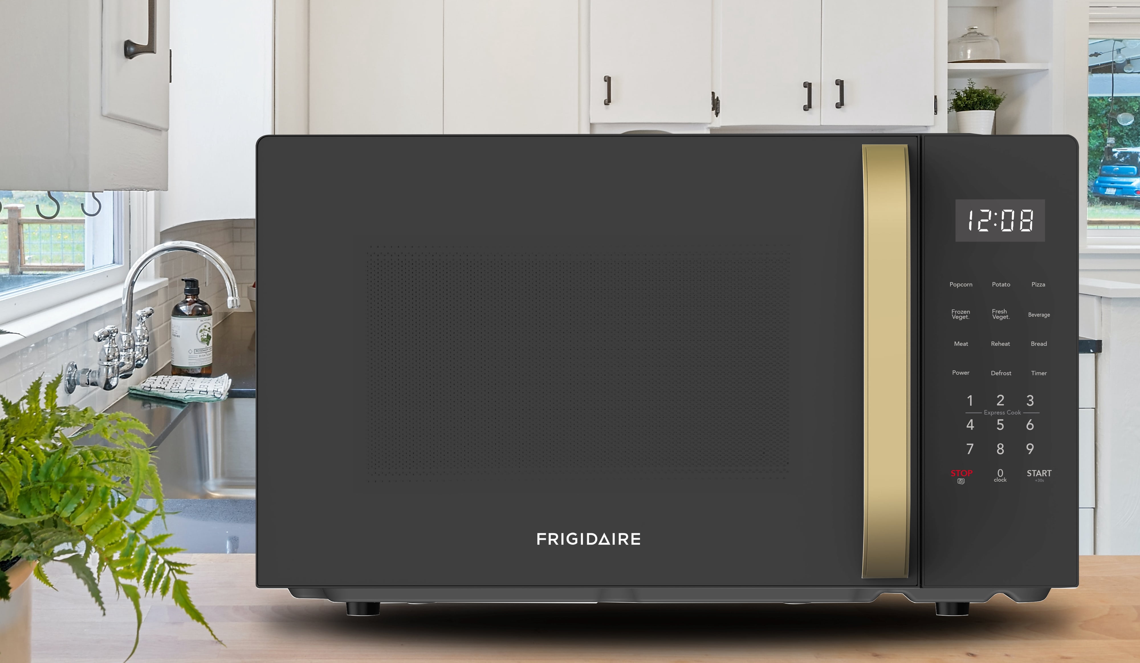 Frigidaire 1.1 Cu. Ft. Countertop Microwave Oven, 900 Watt Microwave with 8 Auto Cook Menus, 10 Power Levels