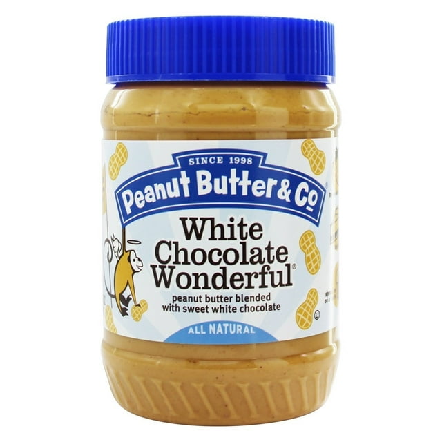 Peanut Butter & Co. White Chocolate Wonderful peanut butter, a 16 oz (454g) jar of all-natural peanut butter blended with sweet white chocolate. The jar features a blue lid and a label with playful peanut graphics and branding.