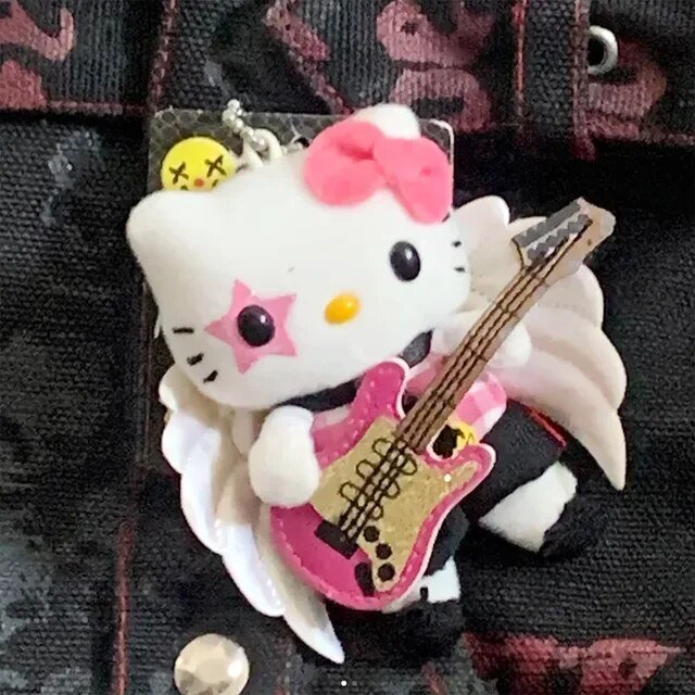 Juguetes de peluche bolsa colgante llavero Kawaii MINISO Sanrio Hello Kitty Rock Angel Y2k accesorios Diy decoración ornamento muñeca regalo