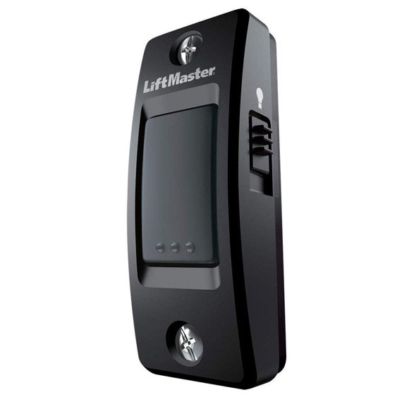 Luz LiftMaster 883LMW con botón pulsador con cable montada en la pared