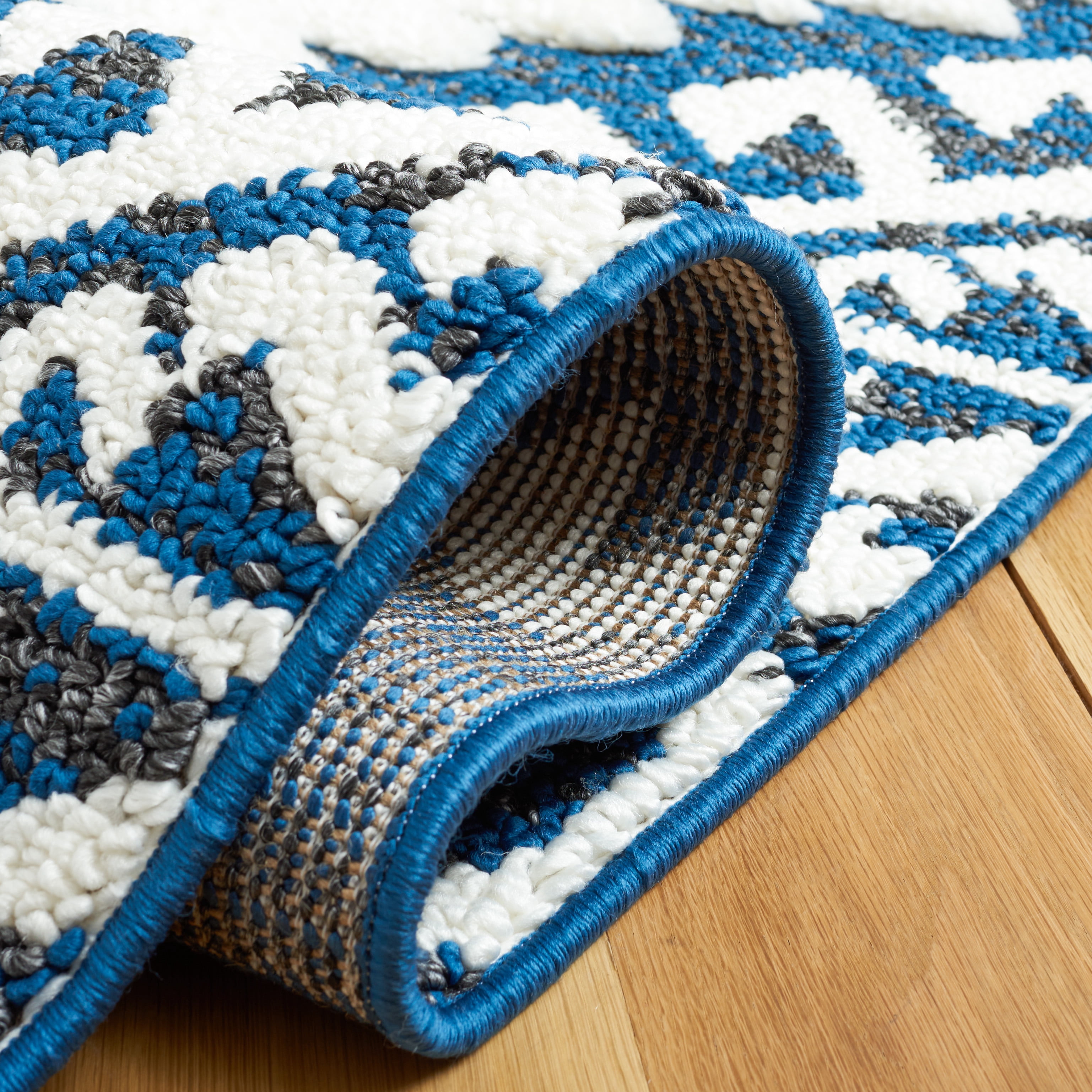 SAFAVIEH Moroccan Tassel Desmond Southwestern Shag Area Rug, Navy/Ivory, 10' x 14'