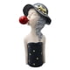 thumbnail image 1 of Figura de resina nórdica con burbujas de jabón, chica de pelo rizado con elegante sombrero de copa. gris, 1 of 8